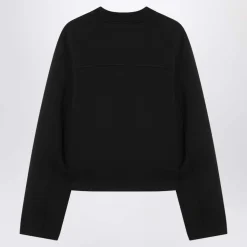 Schwarzer Pullover Edward Enninful Stil