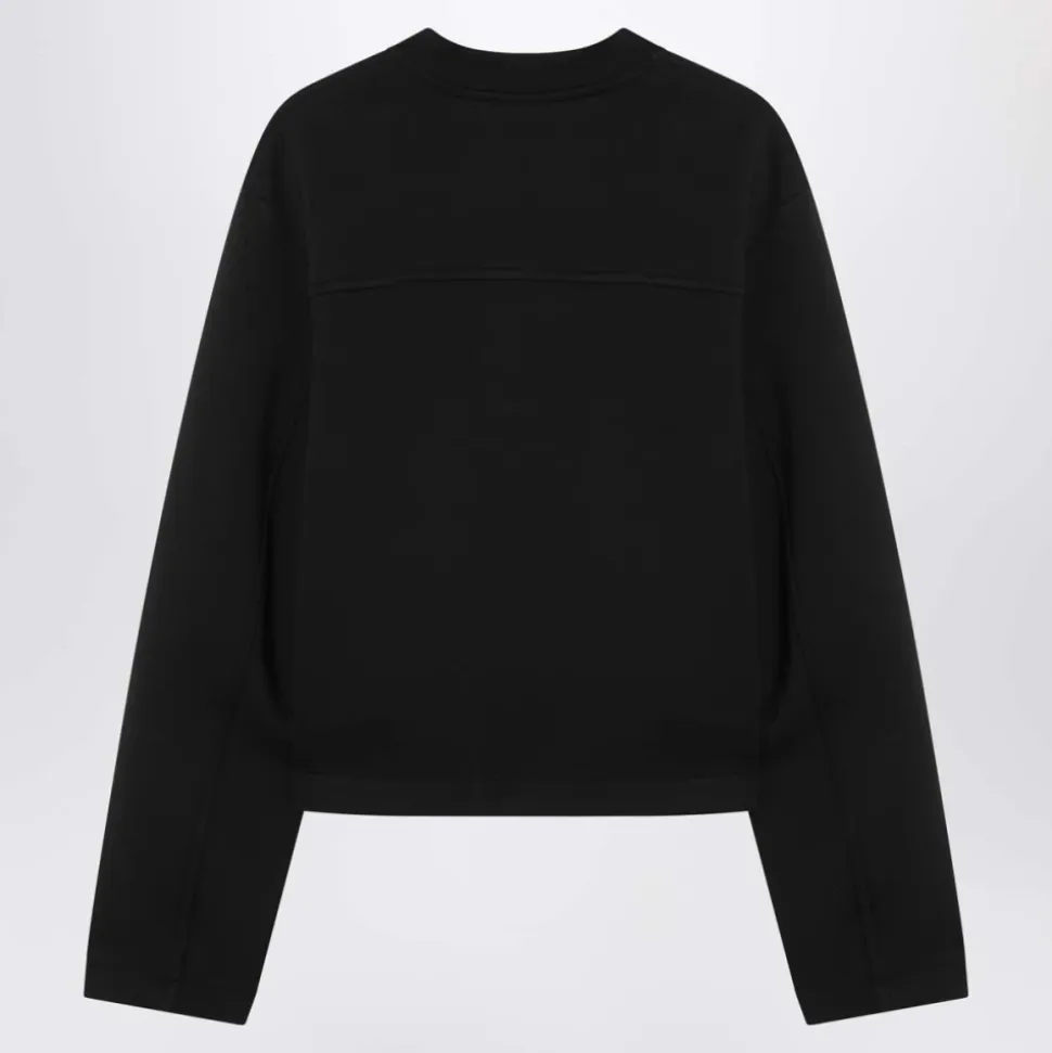 Schwarzer Pullover Edward Enninful Stil