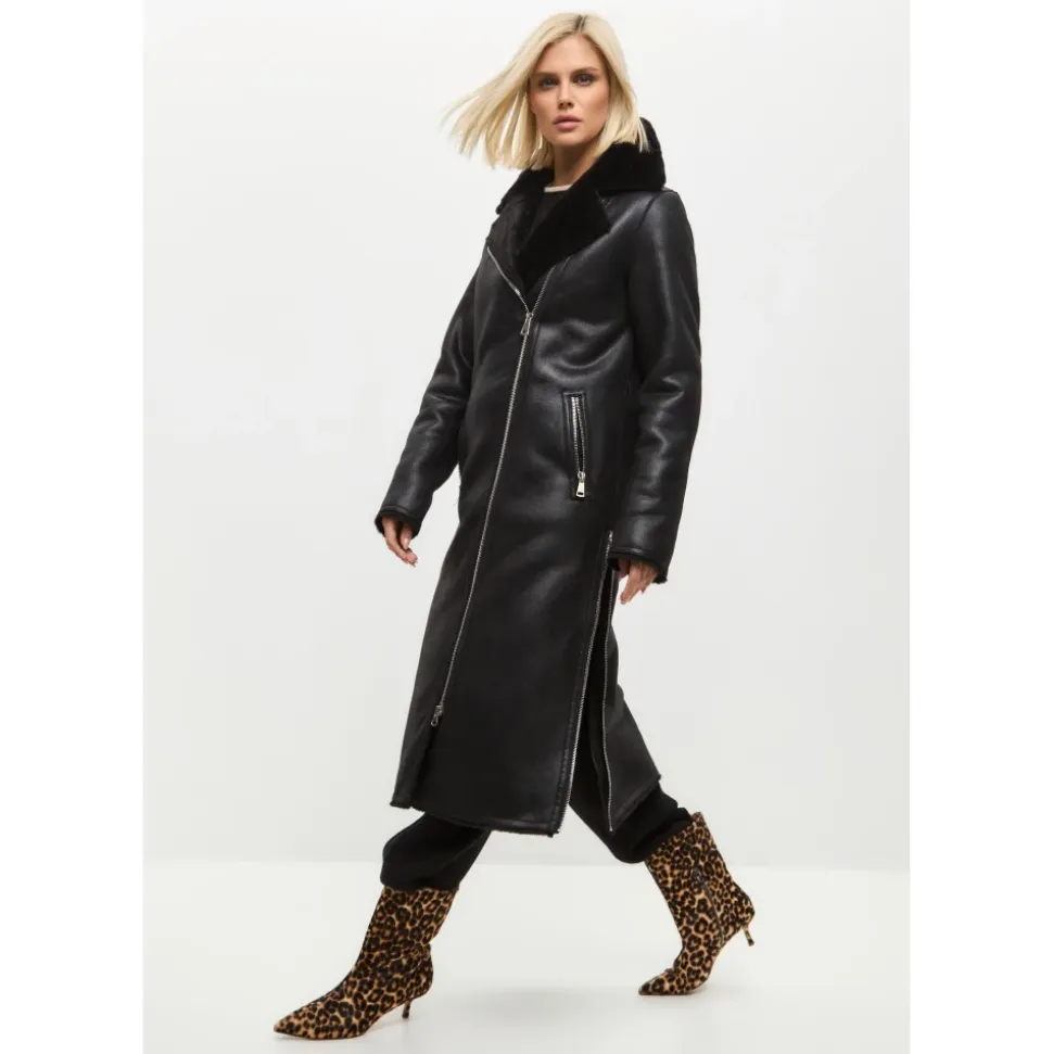 Schwarzer, wendbarer Shearling-Mantel in Langform aus Kunstleder